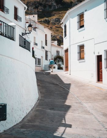 Why does the atmosphere heat up from the ground?