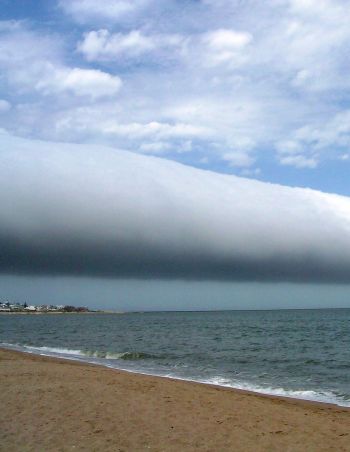 What does it mean when roll clouds appear in the sky?